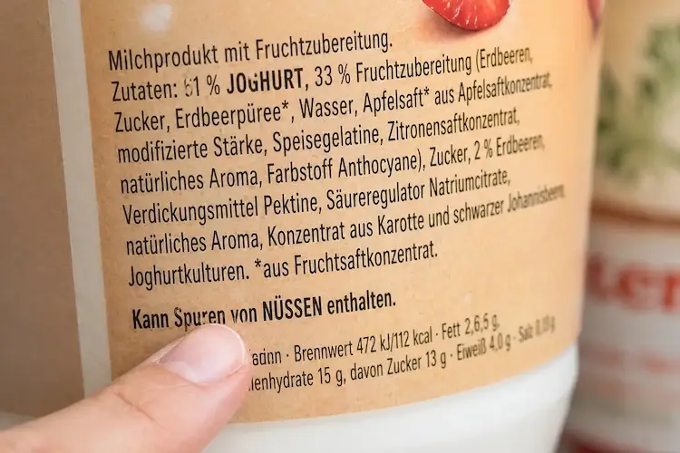 Product label with ingredients and warning label.